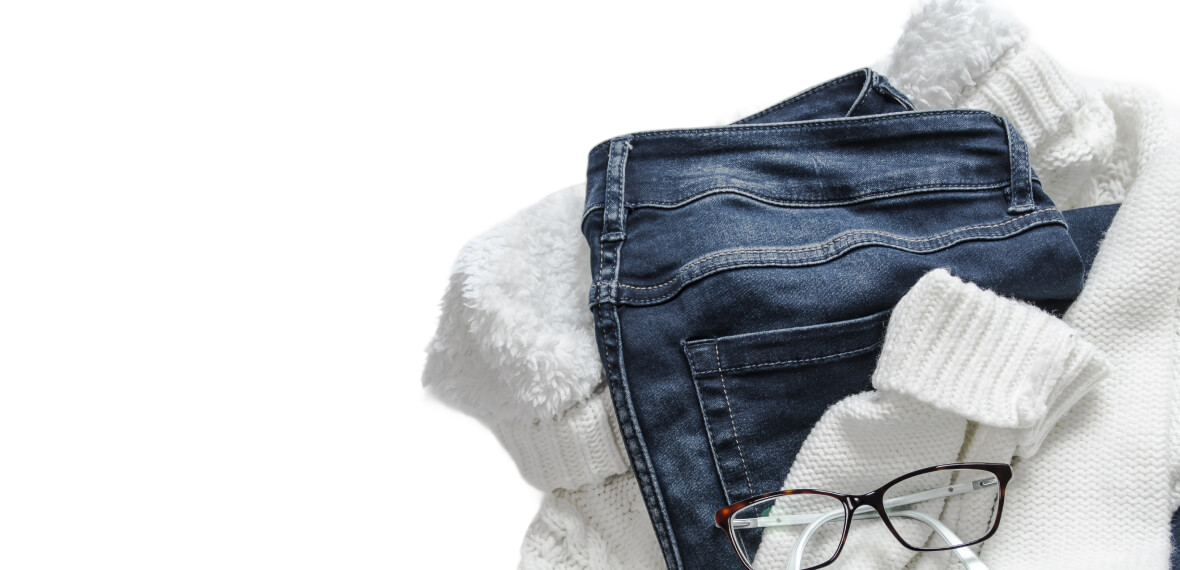 Warm White Knitted Sweater Paired with Classic Blue Denim Jeans