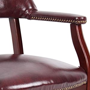 Hand-applied individual brass nail-head trimSolid hardwood frame in a rich mahogany finishNo-sag spring seat for extra comfort and support